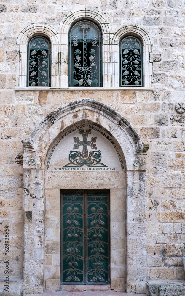 An outside side facade photo of the Church of the Holy Sepulchre in Jerusalem