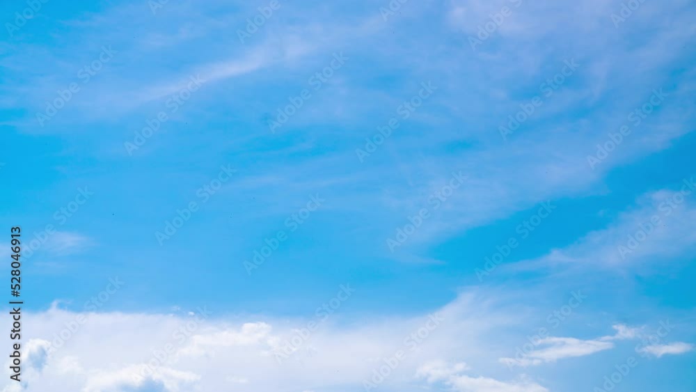 Stunning turquoise horizon with fluffy white clouds lit with bright sun. Soft cumulus clouds movement. Low angle view timelapse. Stunning turquoise horizon with fluffy white clouds lit with bright sun. Soft cumulus clouds movement. Low angle view timelapse.