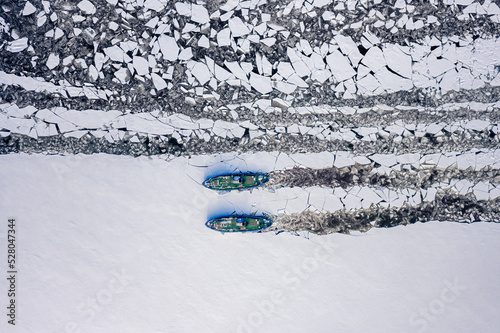 Two icebreakers on river cr...