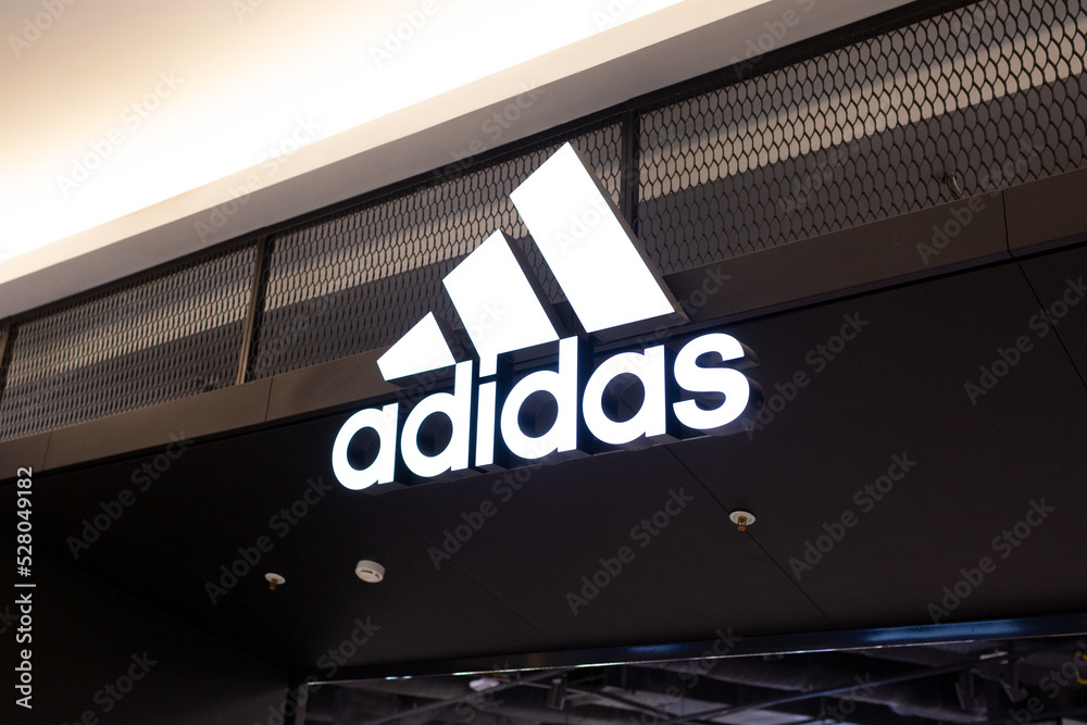 Moscow, Russia - October 2, 2021. Adidas store in Vegas mall. Close-up  logo. German multinational company for the production of sportswear,  footwear, and accessories. Stock Photo | Adobe Stock