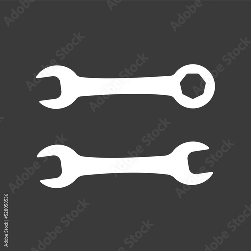 Car service icon. Double Open End Wrench icon white isolated on black. Repair Icon. Vector Logo Template. Two wrench icon. Wrench silhouette