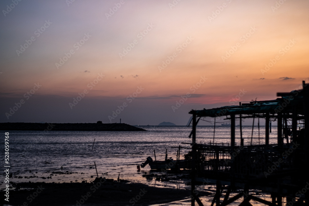 sunset over the sea, fishing village