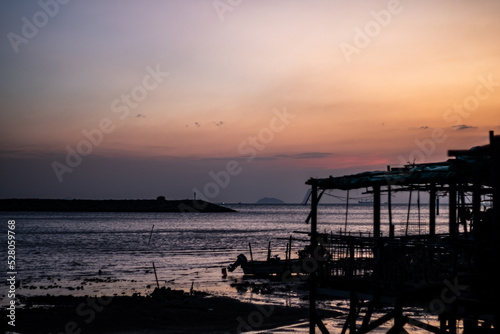 sunset over the sea  fishing village