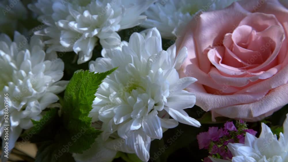 Bouquet of flowers of roses, chrysanthemums close-up. Natural background.
