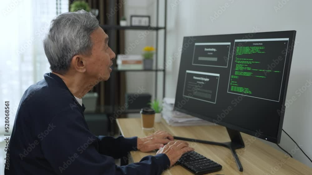 Senior asian man coding and programming on screen desktop. development web, hacker, developer concept. Senior asian man coding and programming on screen desktop. development web, hacker, developer concept.