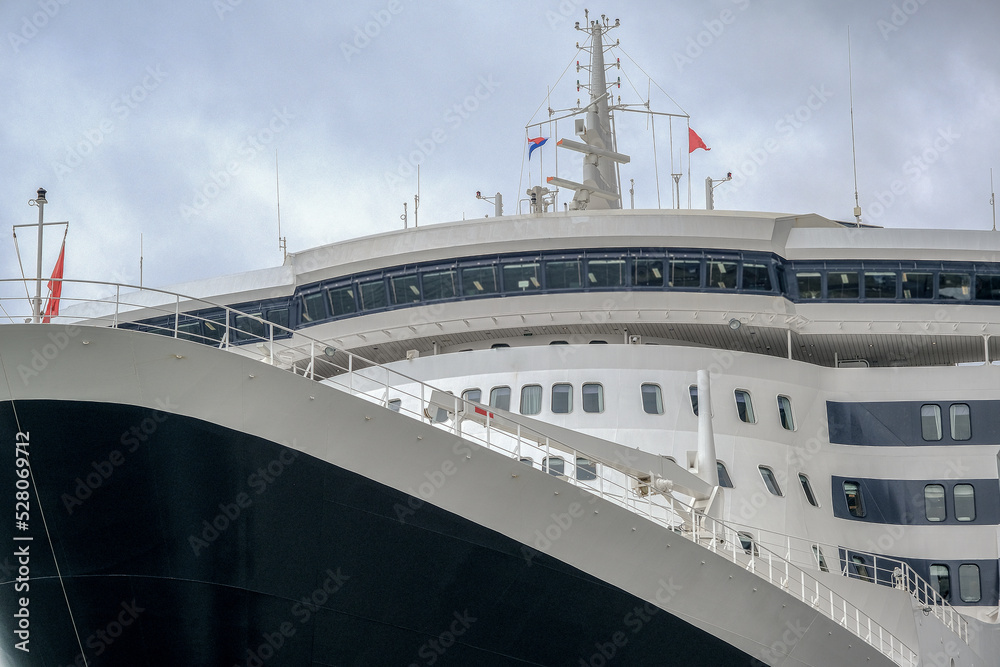 Naklejka premium Ozeanliner im Hafen Rotterdam, Holland - Ocean liner cruiseship cruise ship at cruise terminal in Rotterdam, Netherlands 