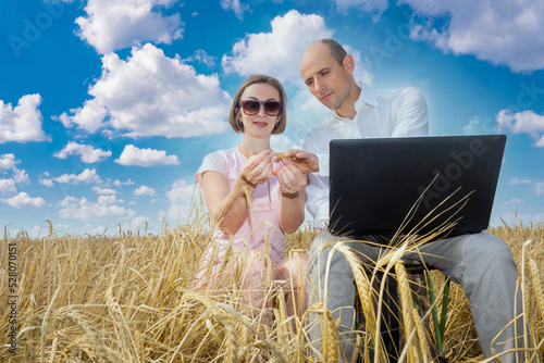 Man and woman in wheat fiel...