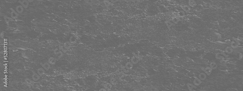 Grainy and distressed black and white background, old black and white grunge texture, dusty and grainy black stone or marble texture, black and white floor surface texture for interior design.