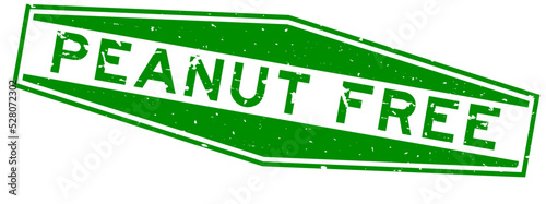 Grunge green peanut free word hexagon rubber seal stamp on white background