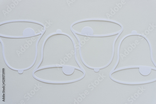 Obraz na plátně white holiday bells on blank paper