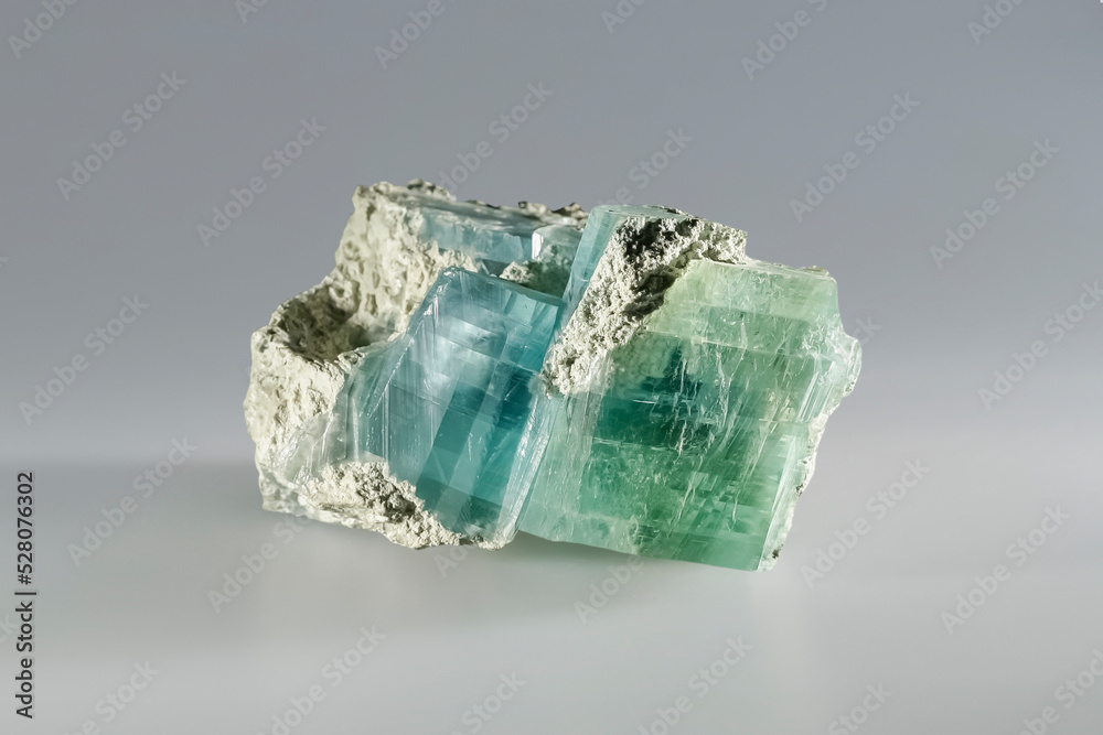 Brucite (hydroxide class) mineral magnesium hydroxide, fused green blue