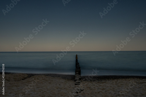Fototapeta Naklejka Na Ścianę i Meble -  sandy beach by the baltic sea at night in summer in POland 