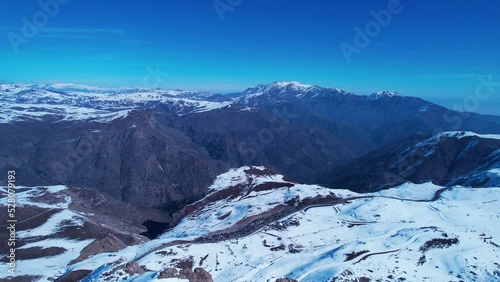 Panoramic view of Ski station centre resort at snowy Andes Mountains near Santiago Chile. Snow mountain landscape. Nevada mountains. Winter travel destination. Winter tourism travel. photo