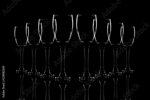 Empty wine glass on a black background