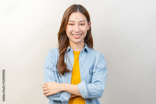 Photography Smile positive, attractive asian young woman wearing casual, portrait of beautiful brunette her with long hair, feeling happy looking at camera, standing cross arms chest isolated on white background
