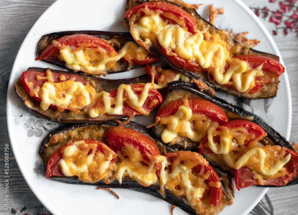 Fried eggplant with tomatoes and cheese. Georgian eggplant Fried eggplant with tomatoes and cheese. Georgian eggplant