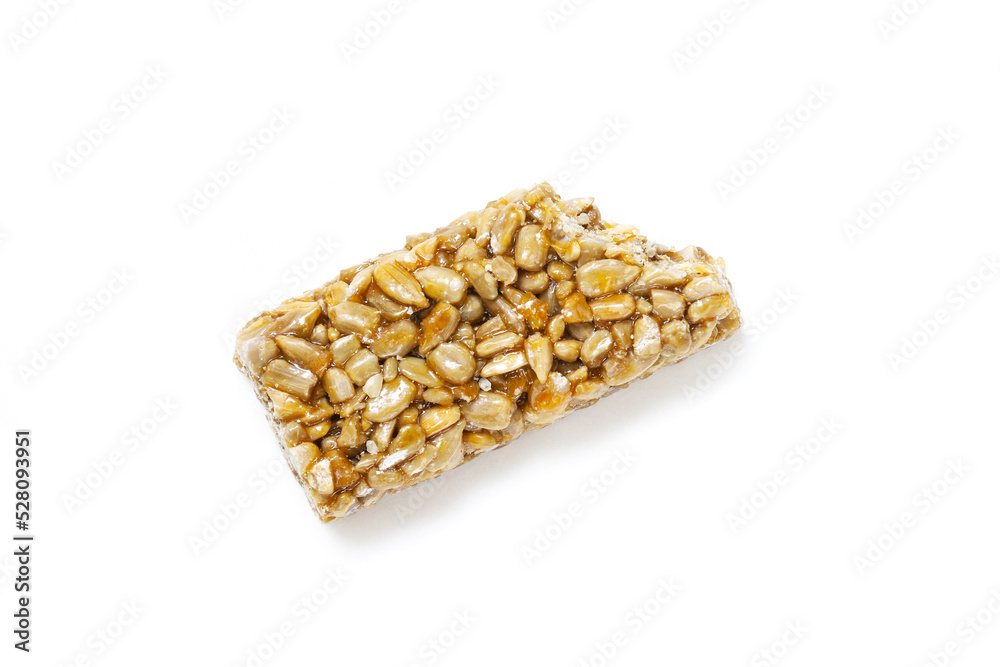 Kozinak from seeds on a white background. Close-up Kozinak from seeds on a white background. Close-up