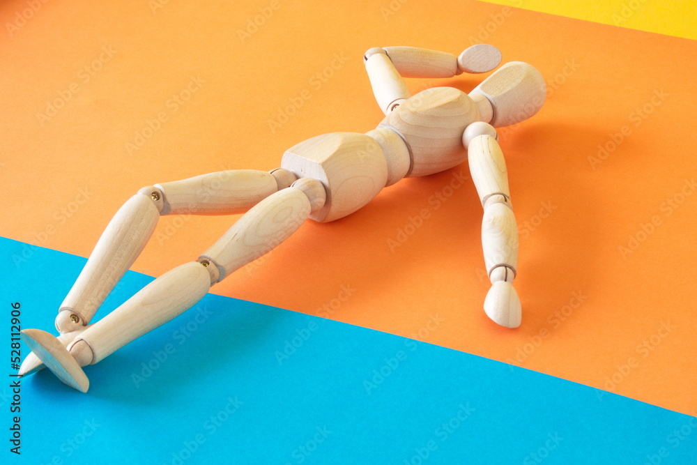 Concept of a tourist resting on the shore of the beach enjoying his vacation with an articulated wooden doll
Concept of a tourist resting on the shore of the beach enjoying his vacation with an articulated wooden doll