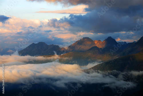 Summer cloudy landscape of the Berner Oberland Alps in Switzerland, Europe