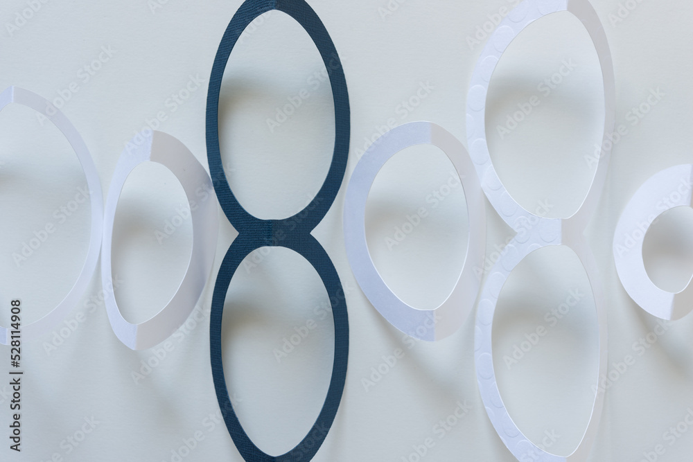folded abstract paper shapes (circles and figure 8s) folded abstract paper shapes (circles and figure 8s)