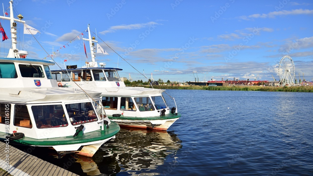 Fototapeta premium Landscape view on the river. Ships at boulevard.