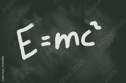 Mass–energy equivalence on chalkboard. Math and physics equations for high school and college. Illustration.