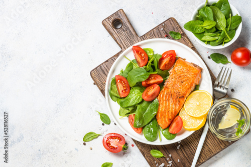 Salmon fillet with fresh salad. Healthy food, keto diet. Healthy lunch or dinner. photo