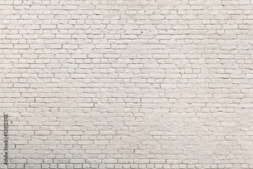 Nostalgic Brickwork Background / Old large white painted shabby chic brick wall (copy space)