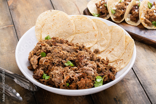 Mexican pork carnitas weith corn tortillas, ready to eat photo