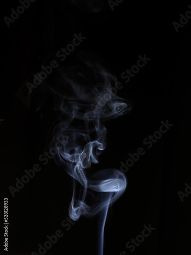 Natural white steam smoke effect on black background with blurred abstract motion for layers of pollution, cigarette smoke, gas, dry ice, hot food, boiling water smoke concept. high quality images