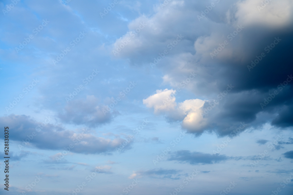 Clouds in the sky. Thick cloud against the blue sky Clouds in the sky. Thick cloud against the blue sky