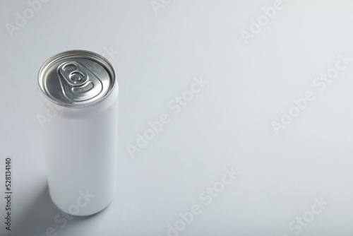 Can of energy drink on white background. Space for text
