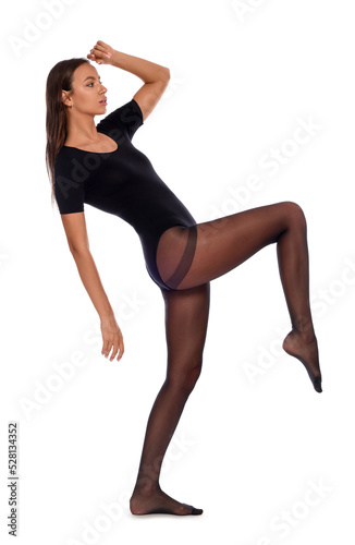Beautiful woman wearing black tights and bodysuit on white background