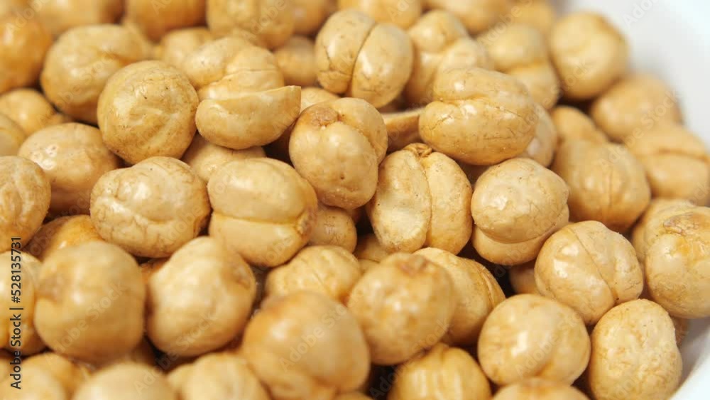 indonesia peanuts in a bowl on table top down . indonesia peanuts in a bowl on table top down .