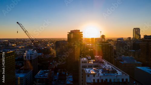 Chicago  IL USA September 1 2022  establishing aerial drone footage of Chicago downtown during sunset on a mid summer evening. the contemporary buildings are beautiful to watch for tourist  