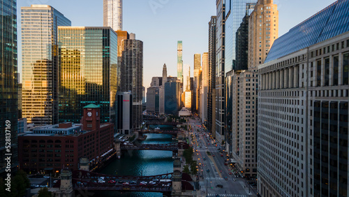 Chicago, IL USA September 1 2022: establishing aerial drone footage of Chicago downtown during sunset on a mid summer evening. the contemporary buildings are beautiful to watch for tourist 