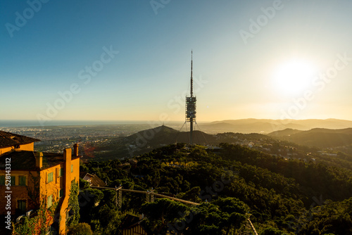 Barcelona, Spain - November 3 2019: Collserola Tower, the highest point in Barcelona, is a tower antenna used mainly as tv and radio transmitter photo