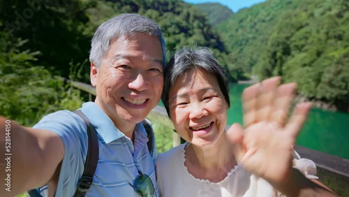 old couple taking selfie video photo