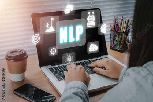 NLP natural language processing cognitive computing technology concept, Business person hand typing keyboard with VR screen NLP icon, AI Artificial intelligence.