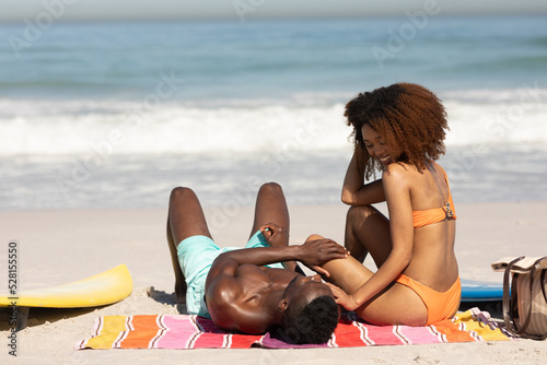 Happy couple spending time together on the beach