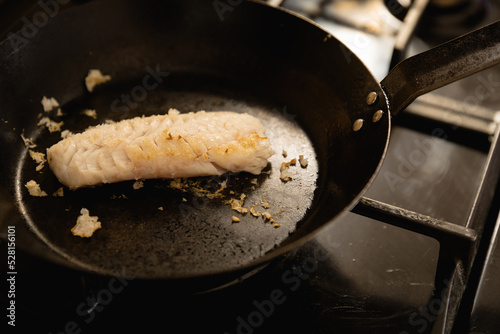 Chef cooking a fish