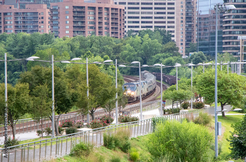 Passenger Train on Tracks by Public Park in Arlington, Virginia, USA
