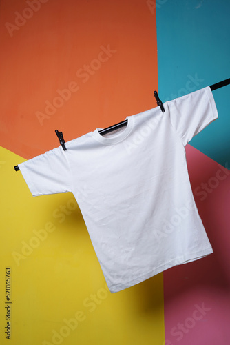White t-shirt mockup over colorful background