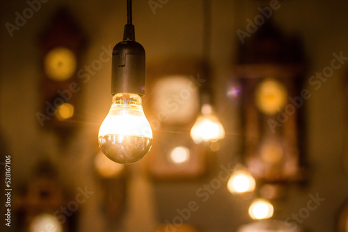 Vintage electric light.Decorative antique edison style light bulbs in coffee shop.vintage tone