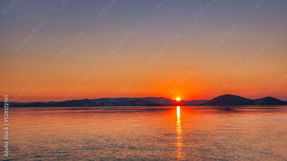Tranquil sunrise on the sea