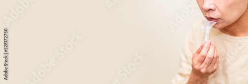 Japanese woman collect saliva for getting negative certificate