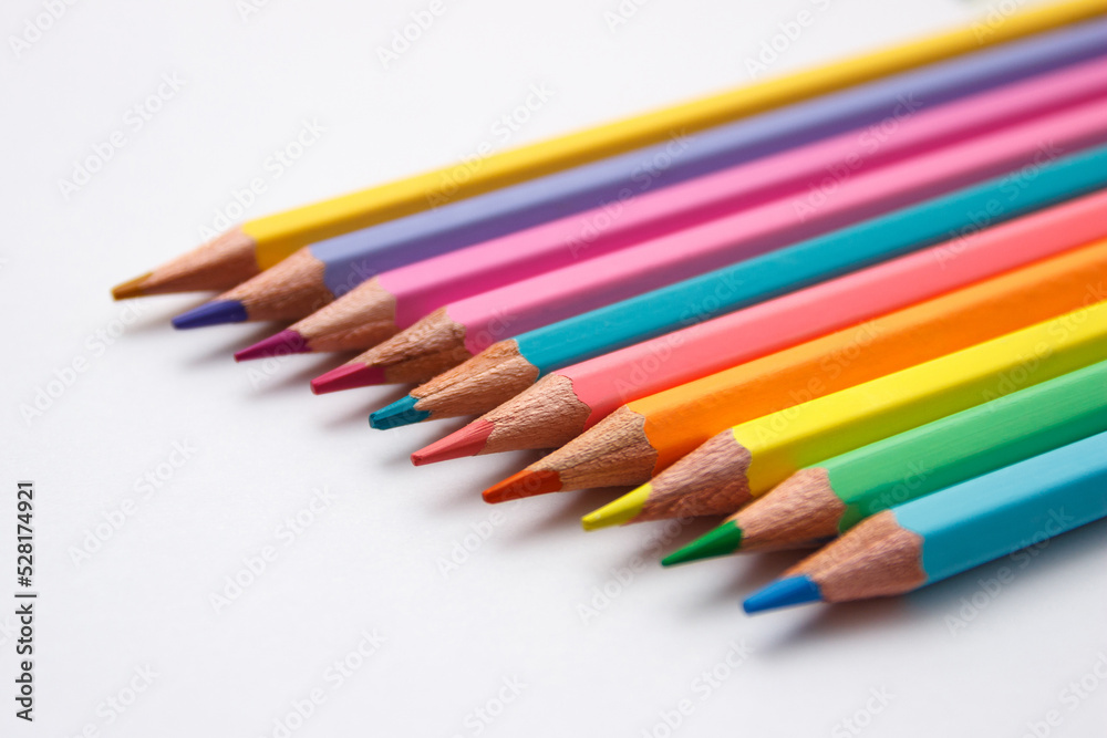 Set of colored pencils, school equipment on the table