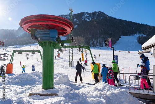 Fényképezés People skiing on slopes in winter scenery in Kranjska Gora in Julian alps, Slove