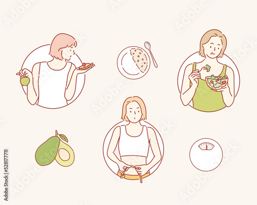 Young woman is resting and eating a healthy salad after a workout. Fitness and healthy lifestyle concept.