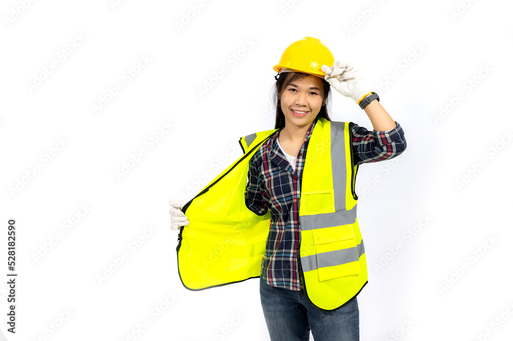 Young woman with a smile in a vest and hard hat on white background. Construction concept, new building. Banner.